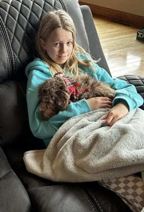 Siblings chilling on the couch