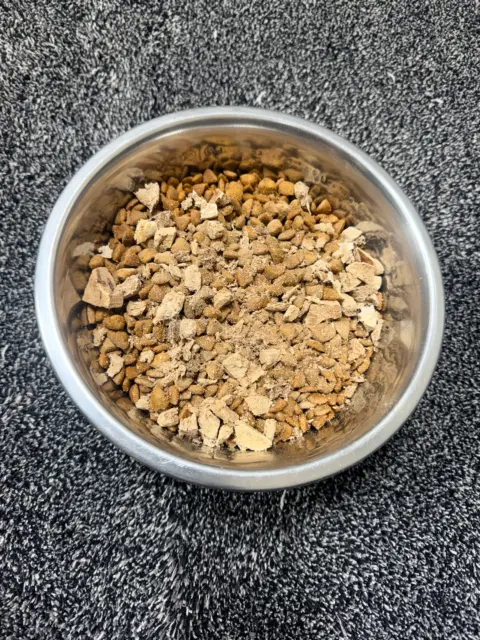 Bernedoodle moms dog food kibble with dried beef liver as topper.