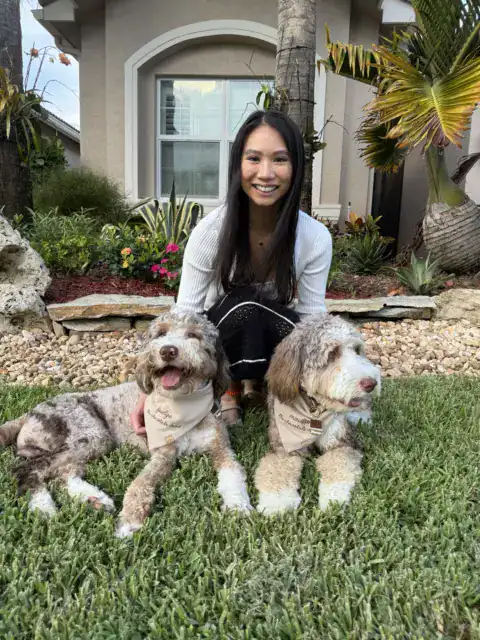 Happy Bernedoodles taking family pictures